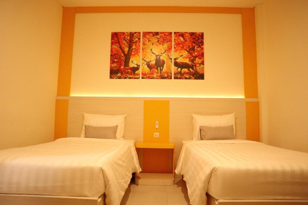 Postel nebo postele na pokoji v ubytování D'Carol Hotel