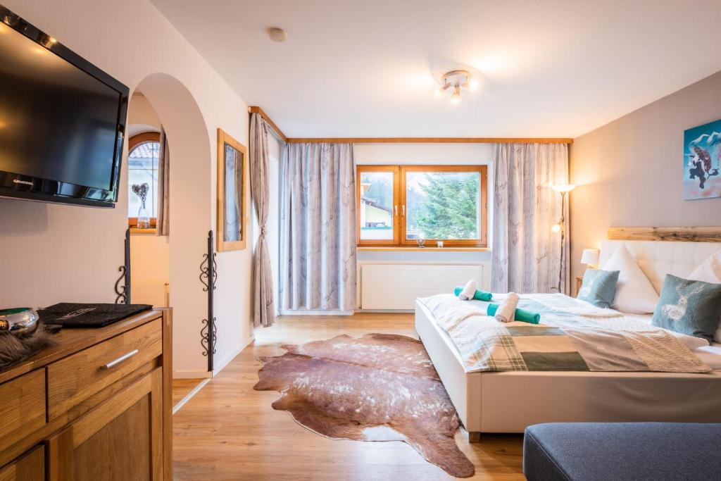 Postel nebo postele na pokoji v ubytování Alpin Resort Austria