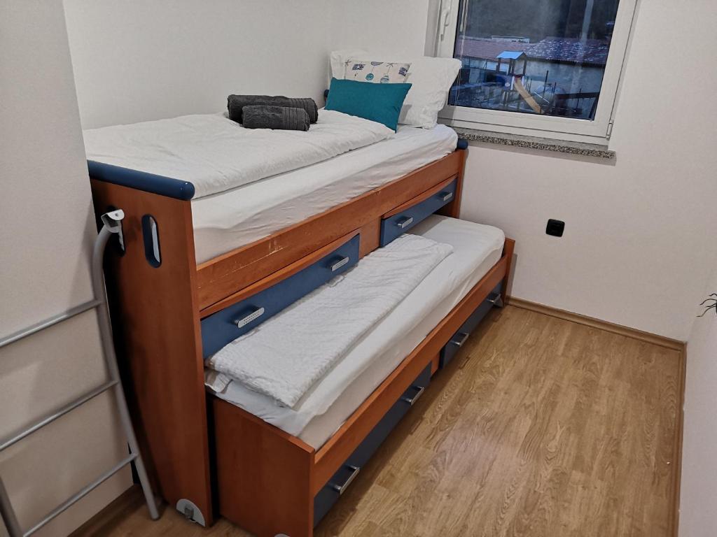 Postel nebo postele na pokoji v ubytování Apartma Apollonio