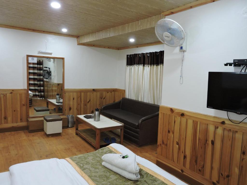 TV a/nebo společenská místnost v ubytování Hotel Chaman Palace