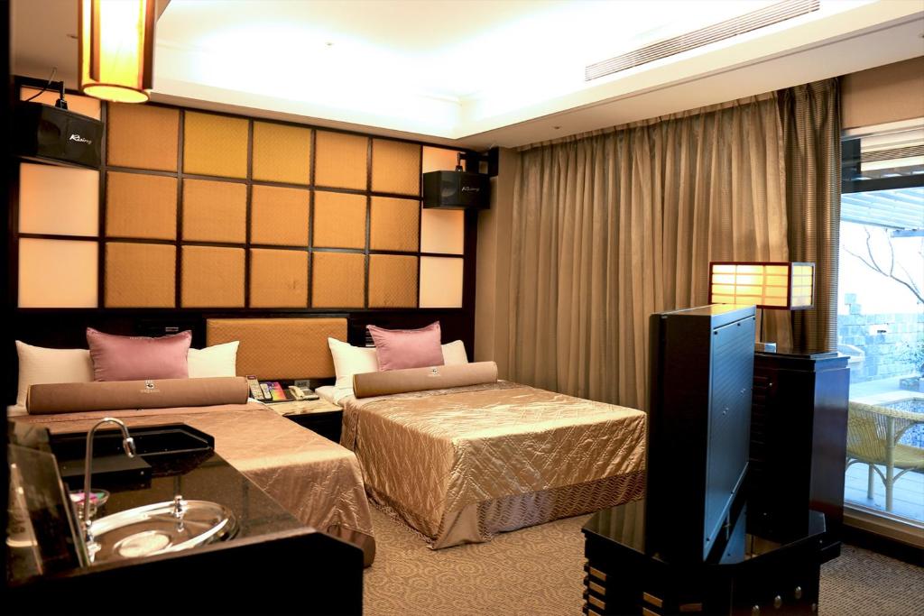 Postel nebo postele na pokoji v ubytování In-stone Motel