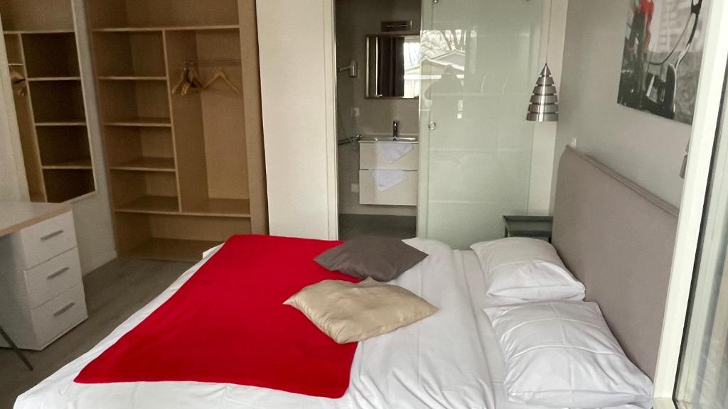 Postel nebo postele na pokoji v ubytování Relais de l'Aérodrome