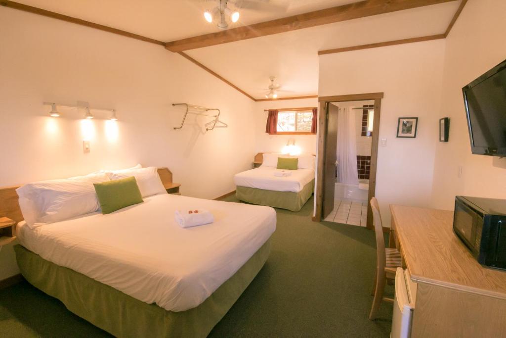 Postel nebo postele na pokoji v ubytování Gateway Motel