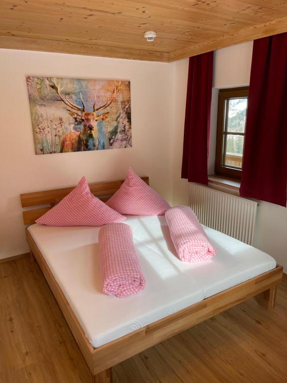 Postel nebo postele na pokoji v ubytování Der Waidachhof Zillertal