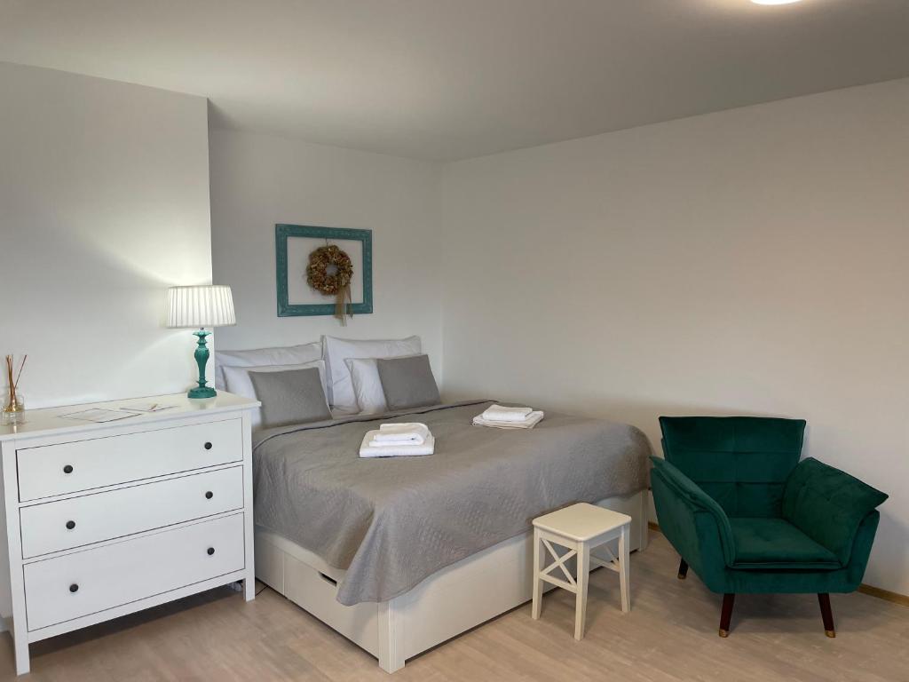 Postel nebo postele na pokoji v ubytování Pálava House Mikulov