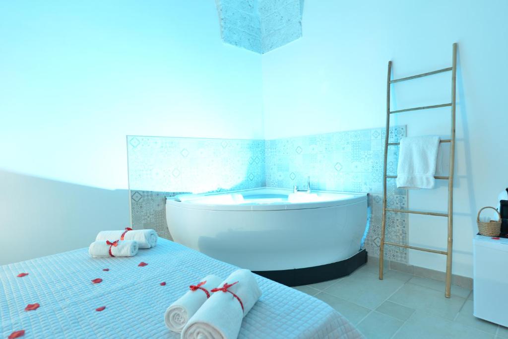 Letto o letti in una camera di Trullo Suite