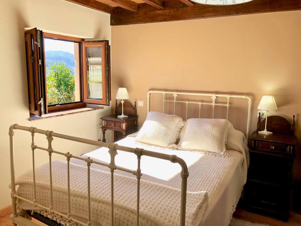 Een bed of bedden in een kamer bij The Cliffs - Casa Crecide