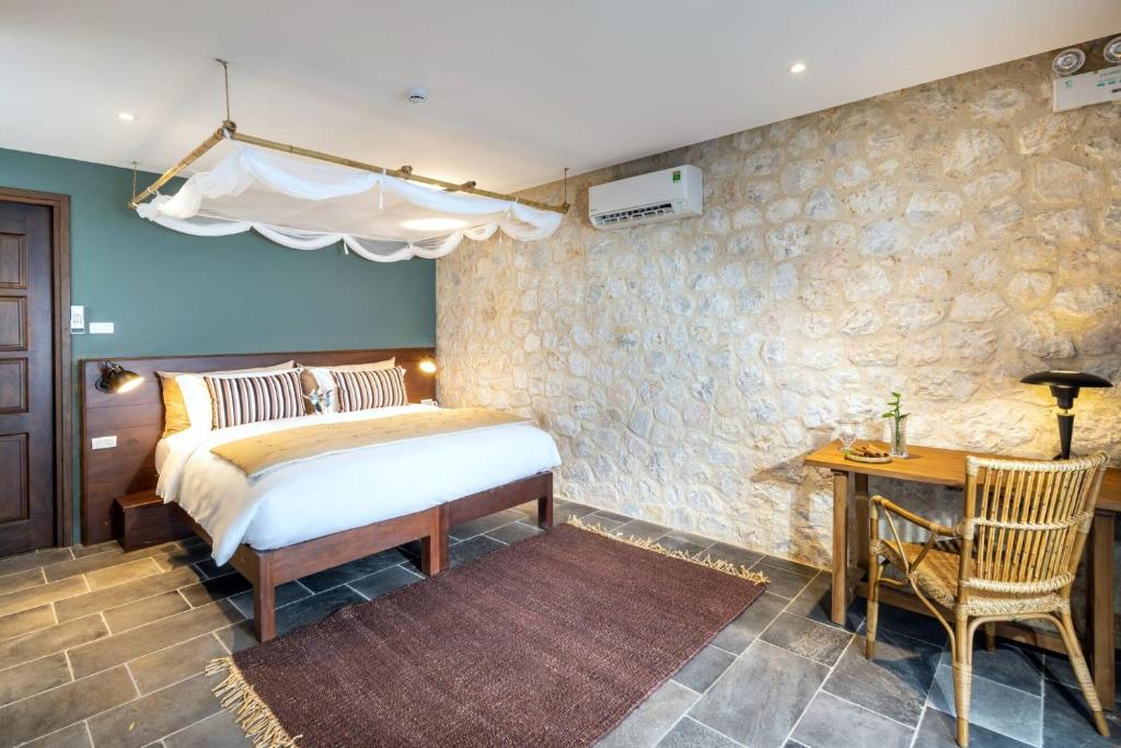 Postel nebo postele na pokoji v ubytování Topas Ecolodge