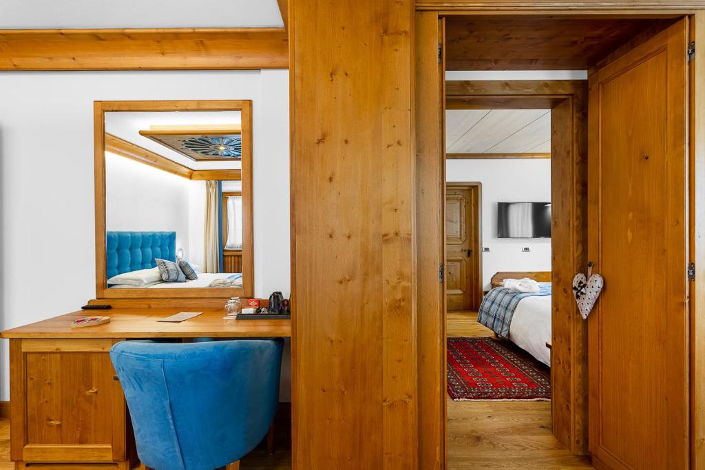 Postel nebo postele na pokoji v ubytování Hotel Natale