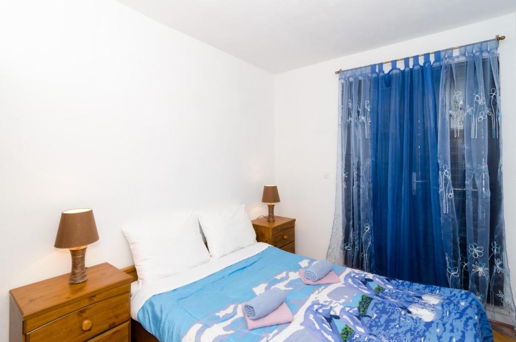 Postel nebo postele na pokoji v ubytování Apartment Amela