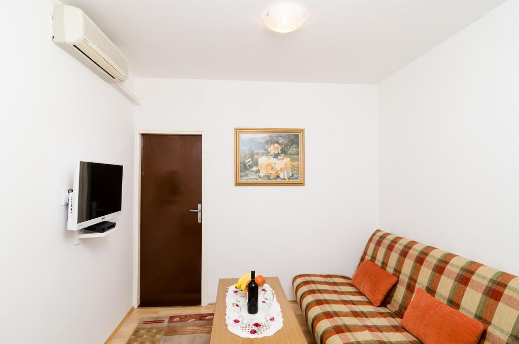 TV a/nebo společenská místnost v ubytování Apartment Amela