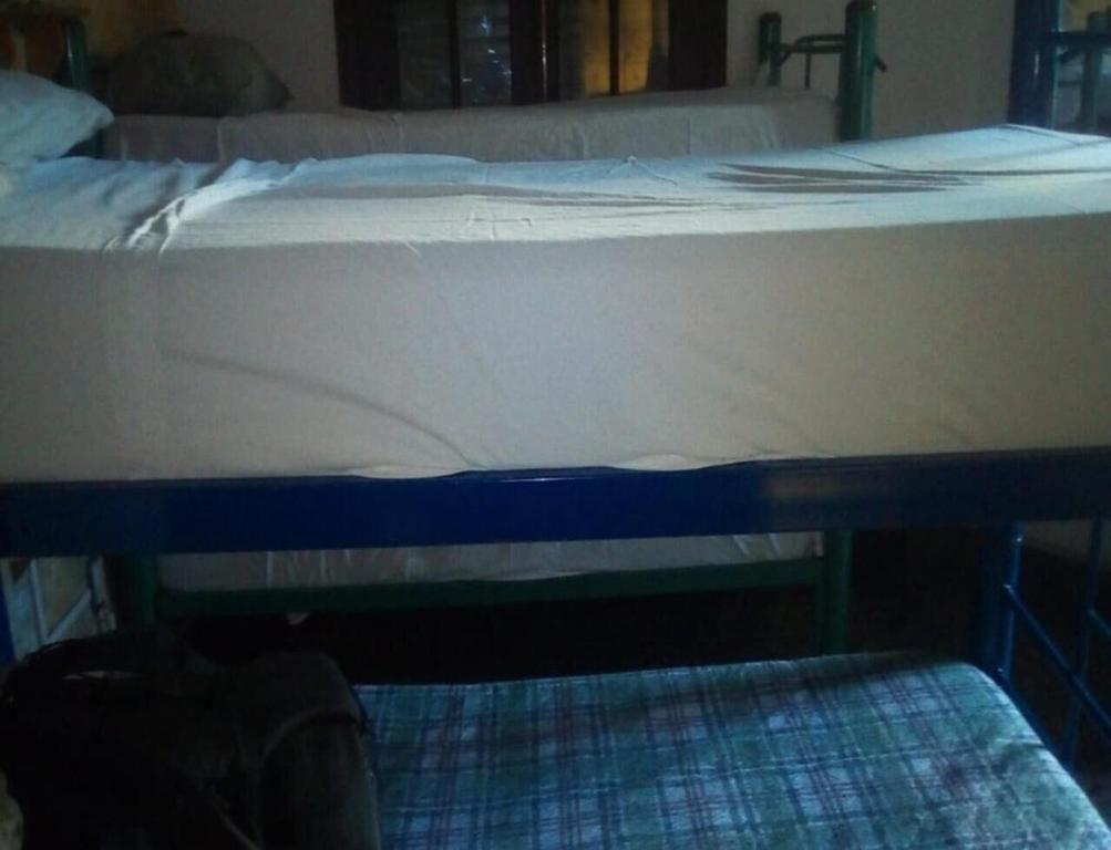 Postel nebo postele na pokoji v ubytování Rivera Hostel Córdoba