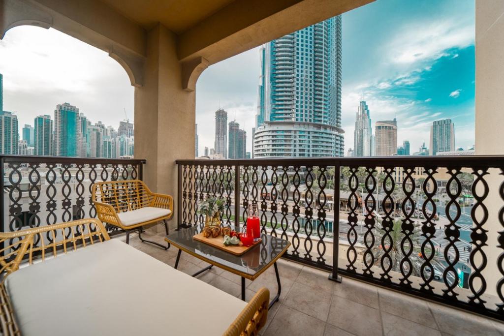 a balcony with a view of a city skyline at Durrani Homes - Glam Living Besides Dubai Mall- 2BR With Study Third Room Converted in Dubai