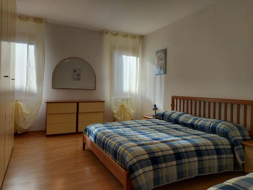 Posteľ alebo postele v izbe v ubytovaní un PO sul Delta