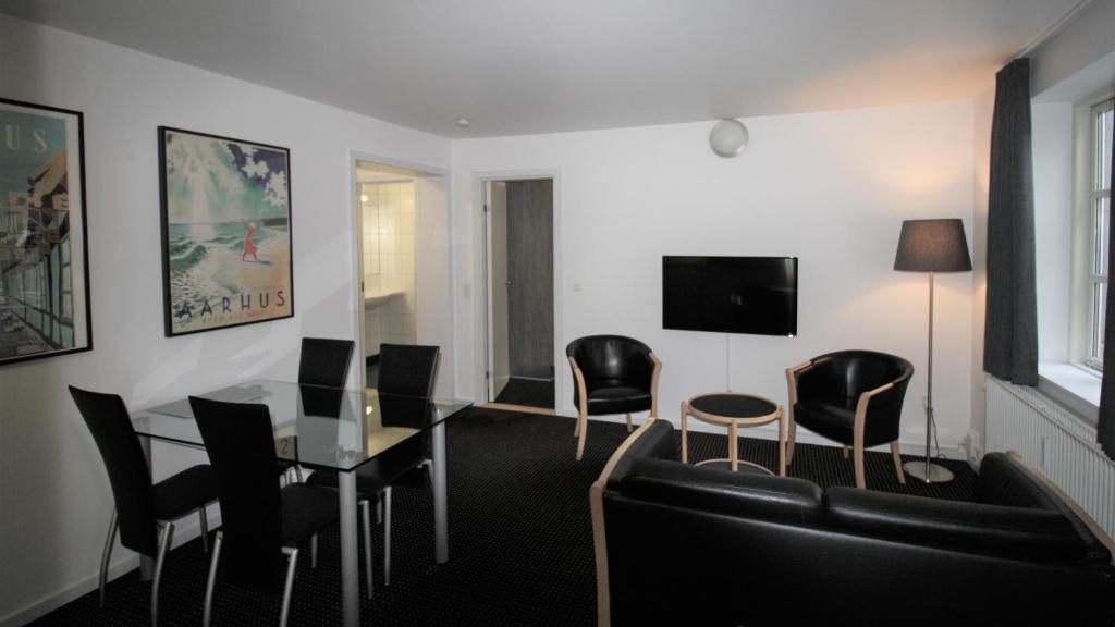 TV a/nebo společenská místnost v ubytování Hotel Aarhus City Apartments