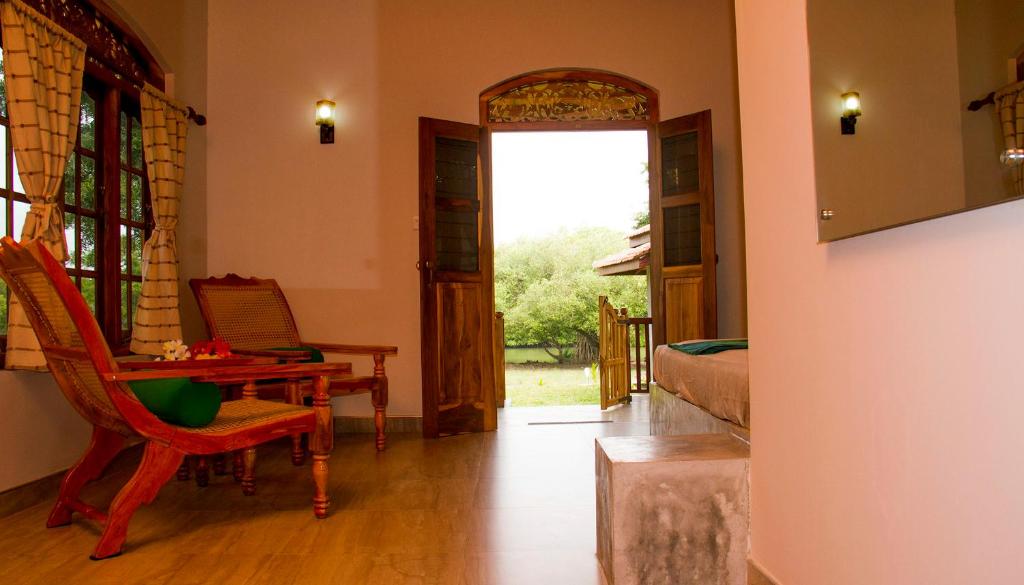 Posezení v ubytování Tranquality Chalets