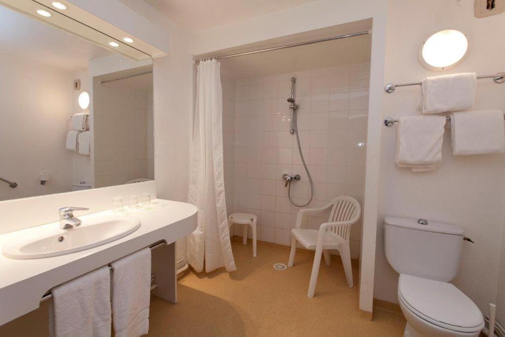 Kupaonica u objektu Hôtel Paradis