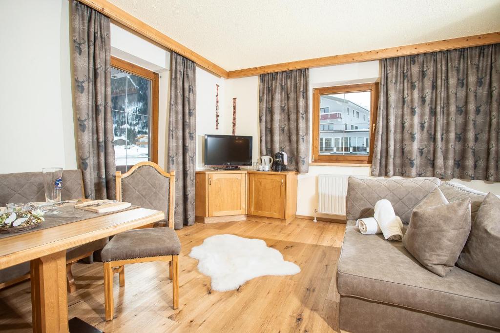 Posezení v ubytování Appartement Frühstückspension Landhaus Karwendel