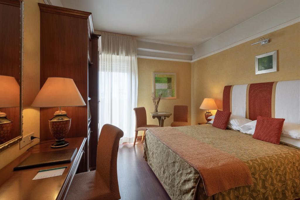 A bed or beds in a room at Bio Boutique Hotel XU' - Gruppo Ambienthotels