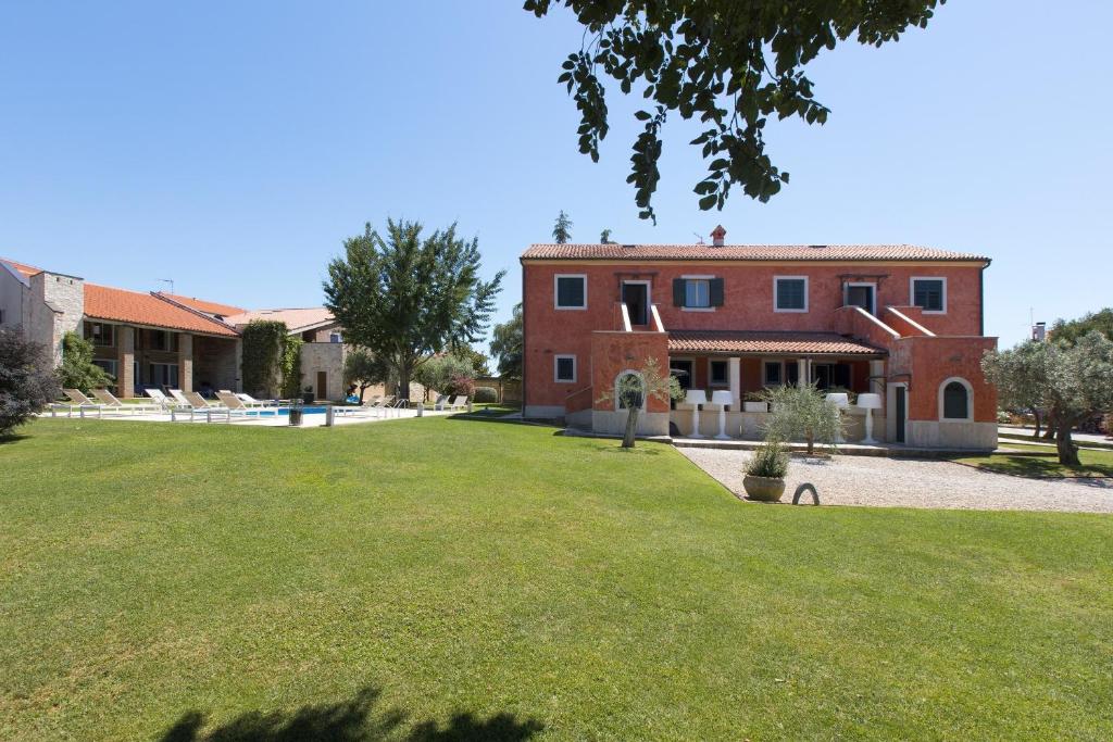 Een tuin van Rooms Alla Beccaccia