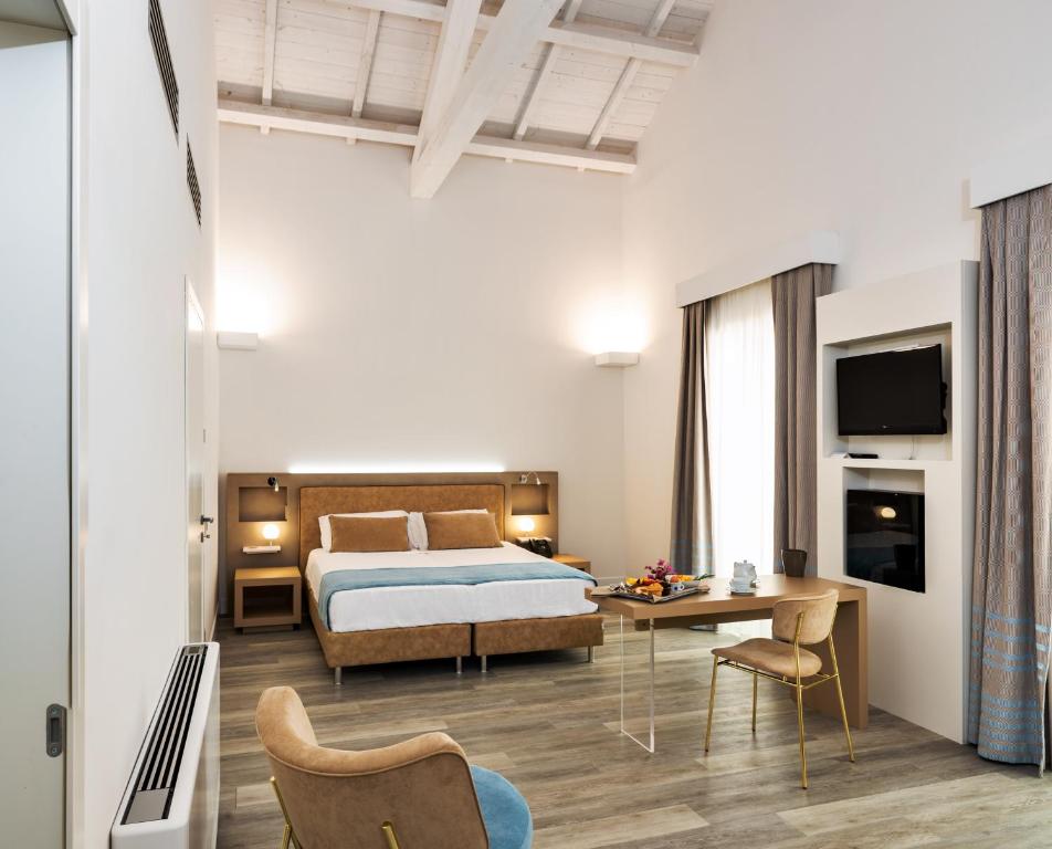Postel nebo postele na pokoji v ubytování Hotel Italia