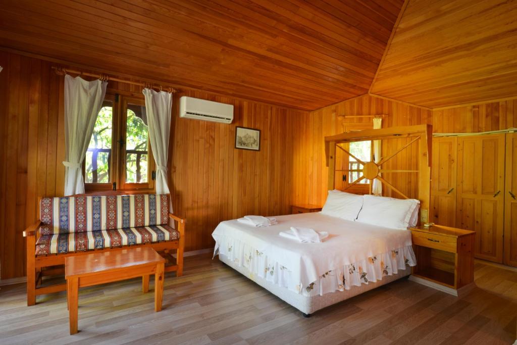 Postel nebo postele na pokoji v ubytování Arcadia Hotel