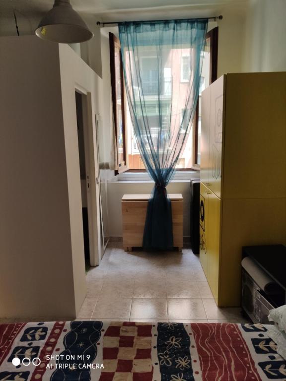 Postel nebo postele na pokoji v ubytování Navigli Milan house