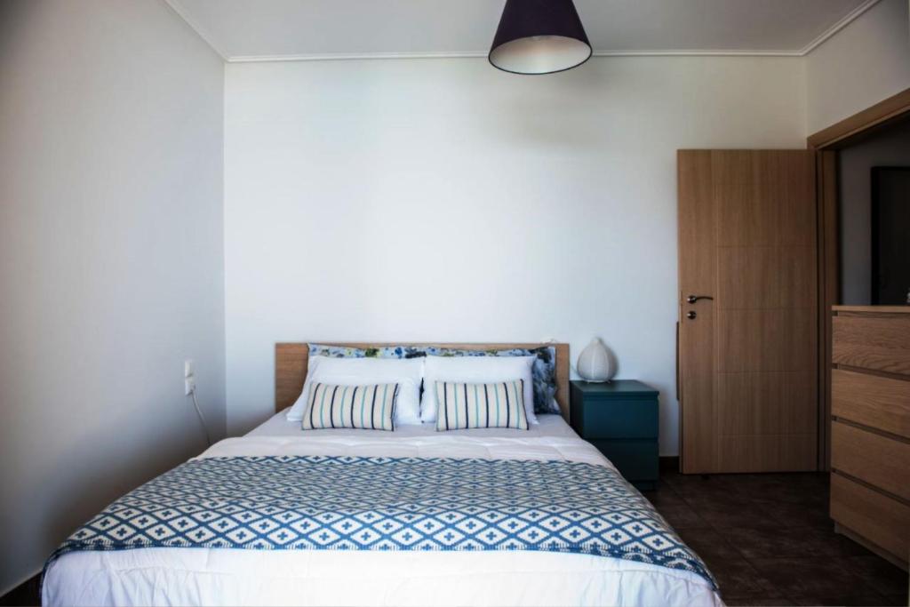 Postel nebo postele na pokoji v ubytování Apollo Romantic Sea View Villa