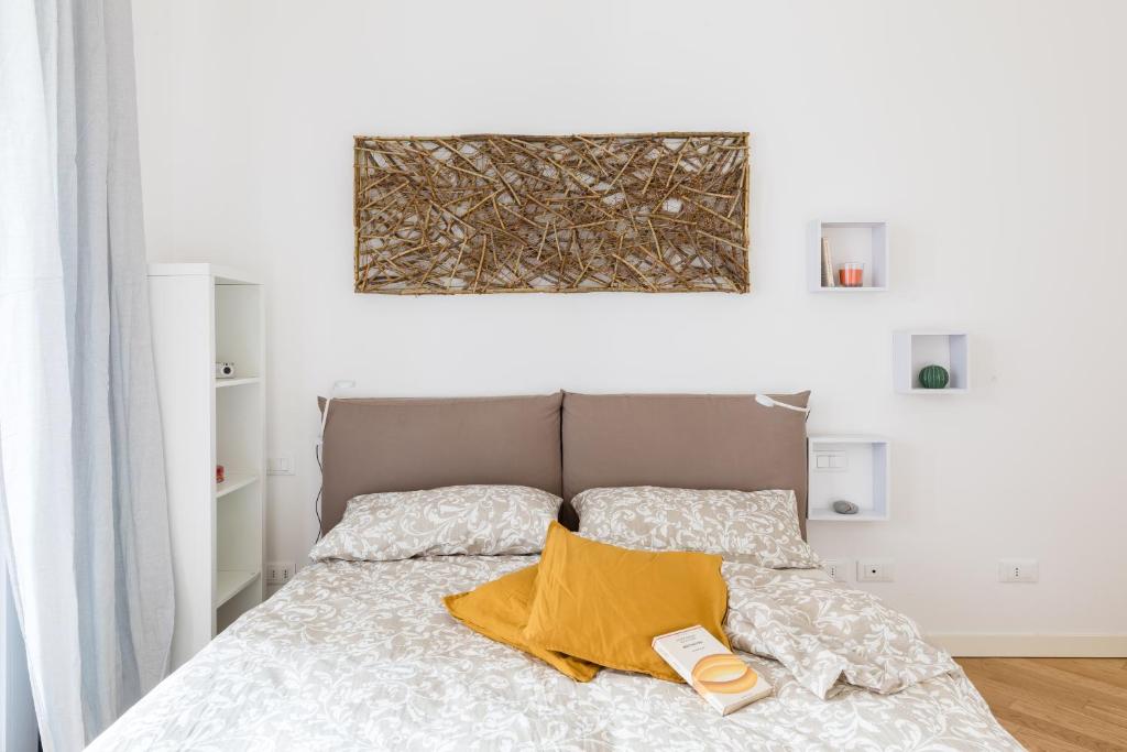 Ein Bett oder Betten in einem Zimmer der Unterkunft Porto Fluviale House