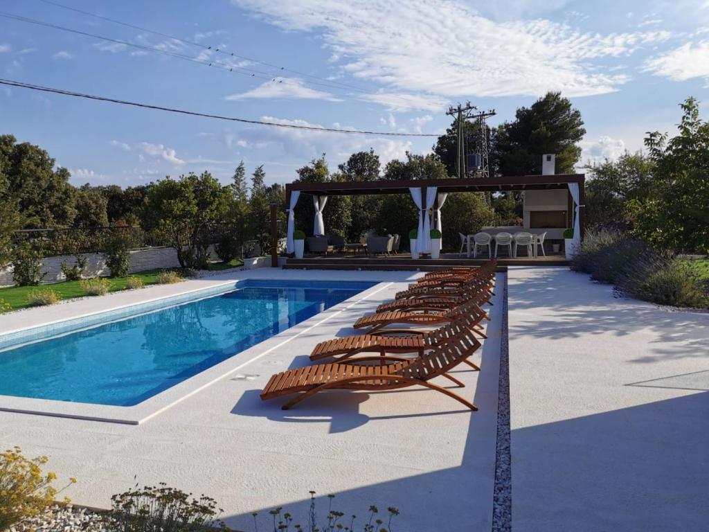 Bazén v ubytování Luxury Villa Reina nebo v jeho okolí