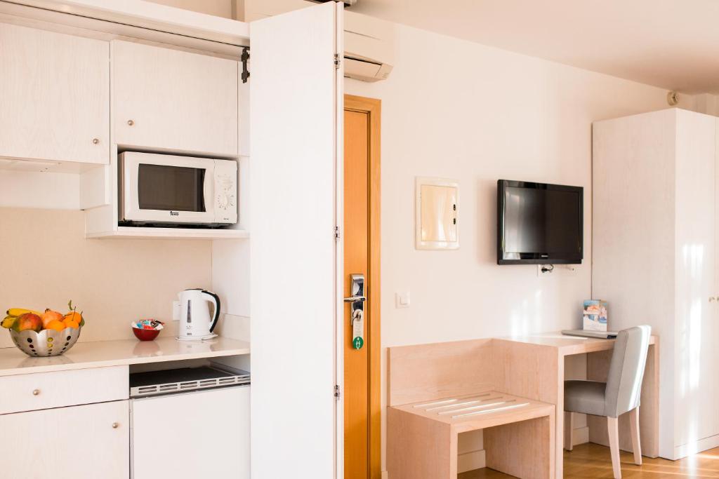 A kitchen or kitchenette at Sagitario Playa