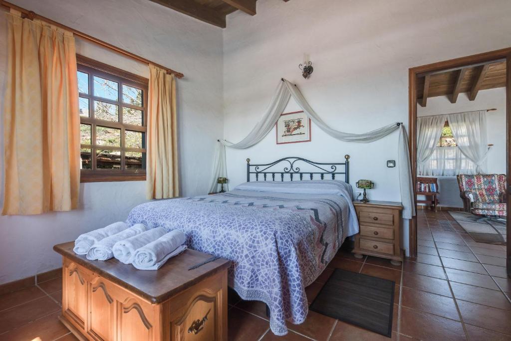 Postel nebo postele na pokoji v ubytování La Cuadra de Arona