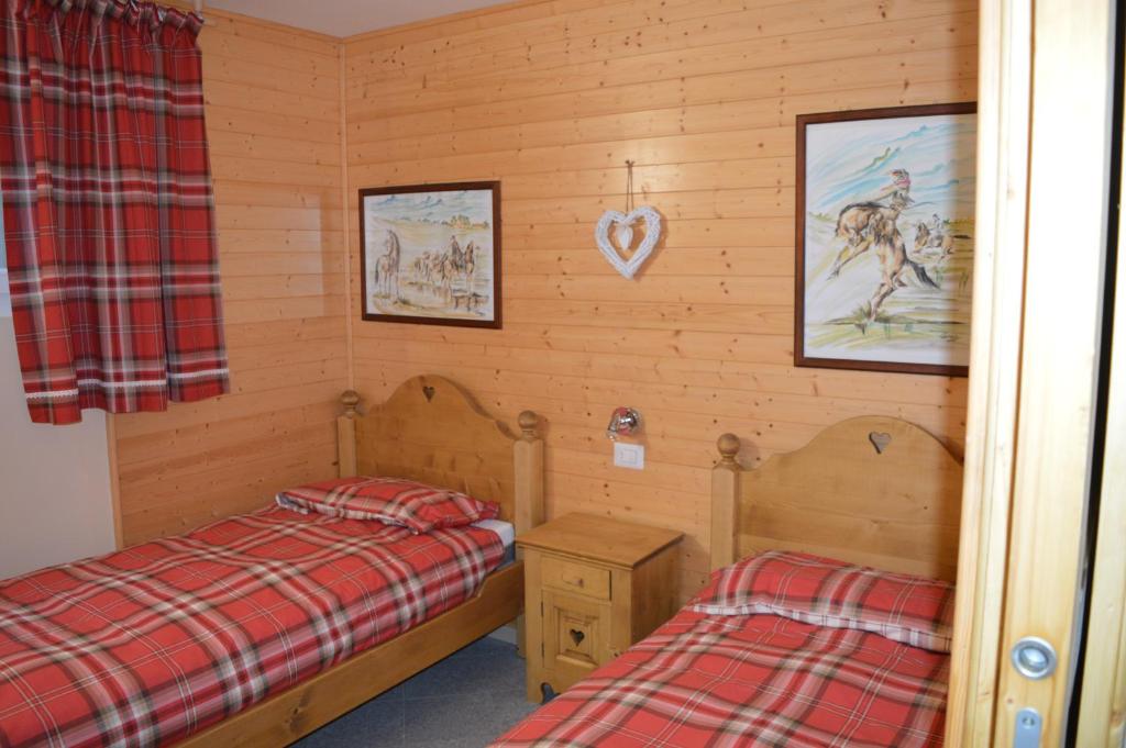 Posteľ alebo postele v izbe v ubytovaní BAITA SIBERIA
