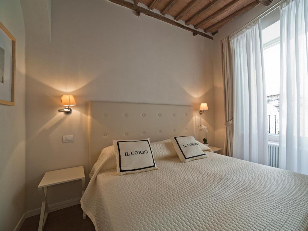 Postelja oz. postelje v sobi nastanitve B&B Il Corso