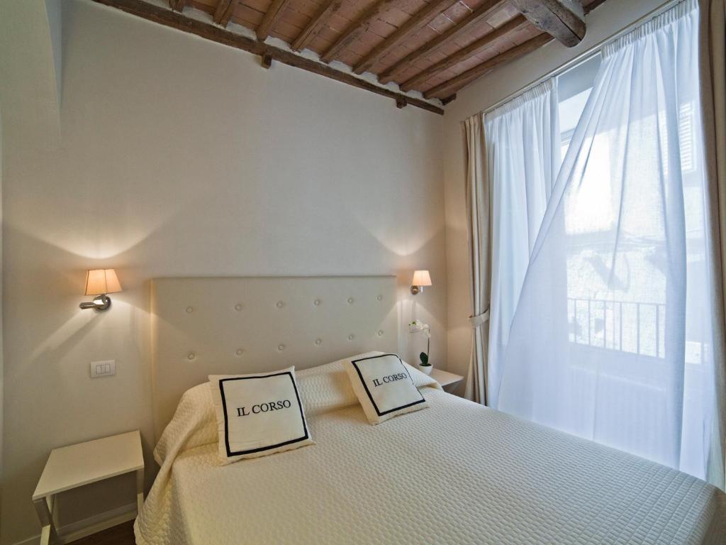 Postelja oz. postelje v sobi nastanitve B&B Il Corso