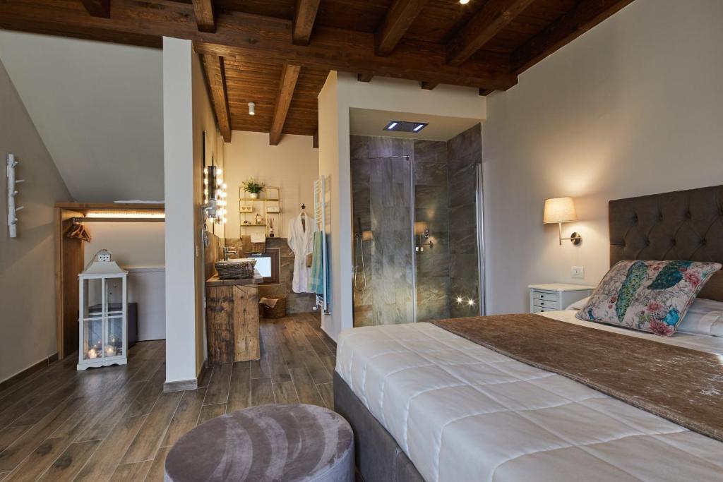 Postel nebo postele na pokoji v ubytování Il Castelluccio Country Resort Restaurant & SPA
