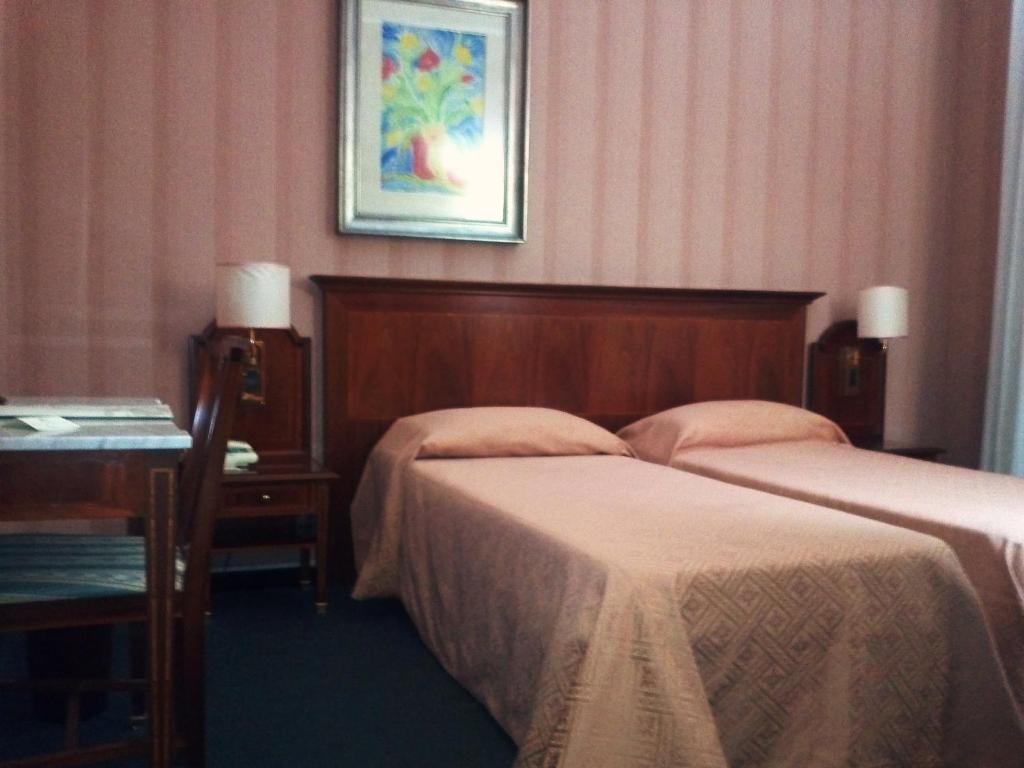 Postel nebo postele na pokoji v ubytování Hotel Esplanade