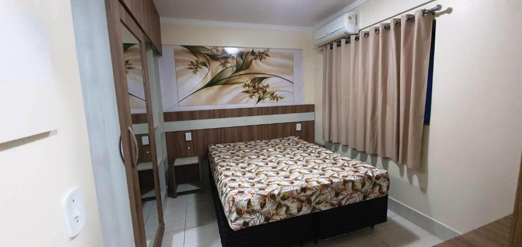 מיטה או מיטות בחדר ב-Caldas Novas - Lacqua diRoma II -