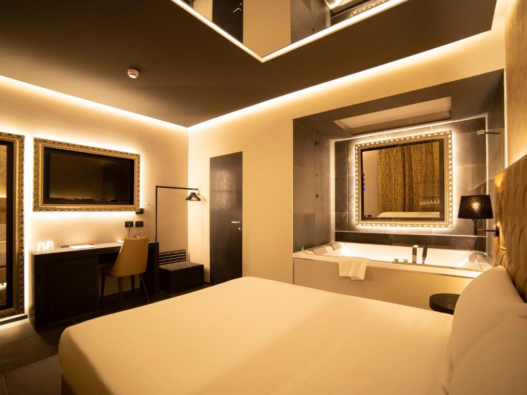 Postel nebo postele na pokoji v ubytování Motel Hotel Charlie