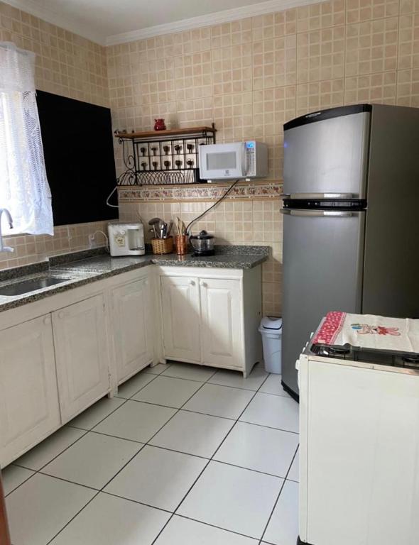 Linda casa de frente para o mar. Ótima localização