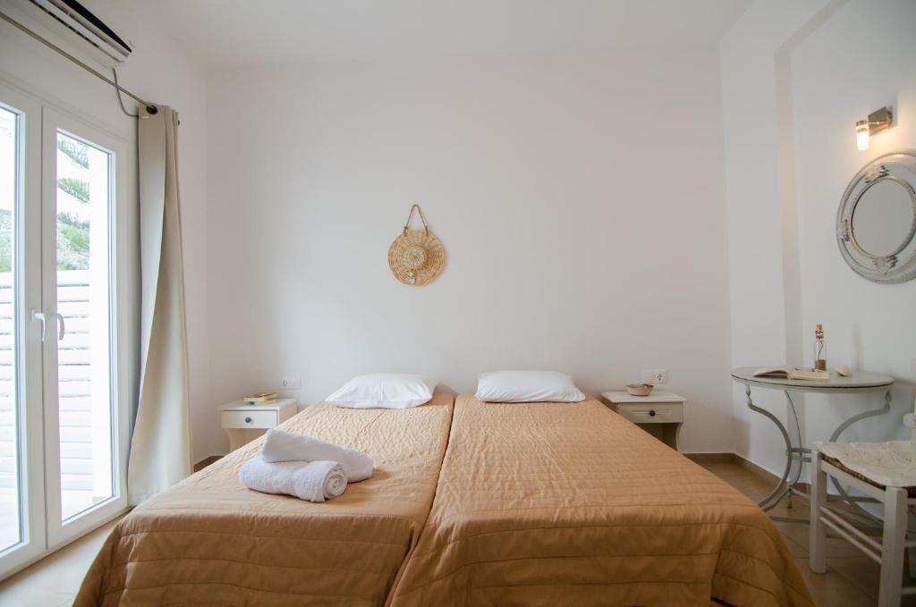Voodi või voodid majutusasutuse Marias Rooms toas
