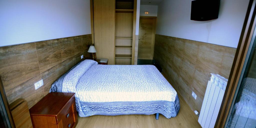 A bed or beds in a room at Domus Viatoris