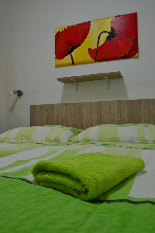 Postel nebo postele na pokoji v ubytování Hotel Děčín Na Skřivánce