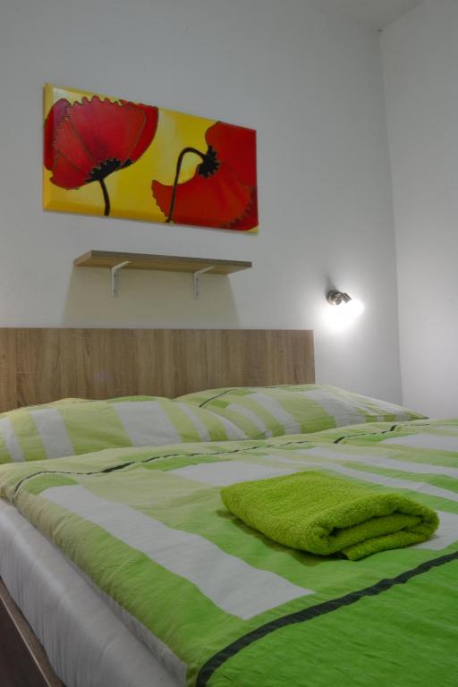 Postel nebo postele na pokoji v ubytování Hotel Děčín Na Skřivánce