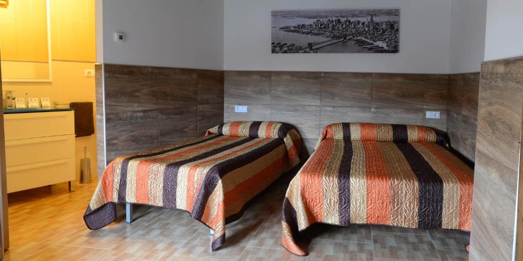 A bed or beds in a room at Domus Viatoris