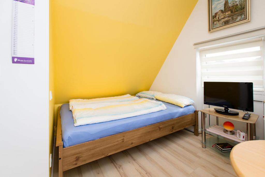 Postel nebo postele na pokoji v ubytování Casa Felicitas - Ferienwohnung & Studio