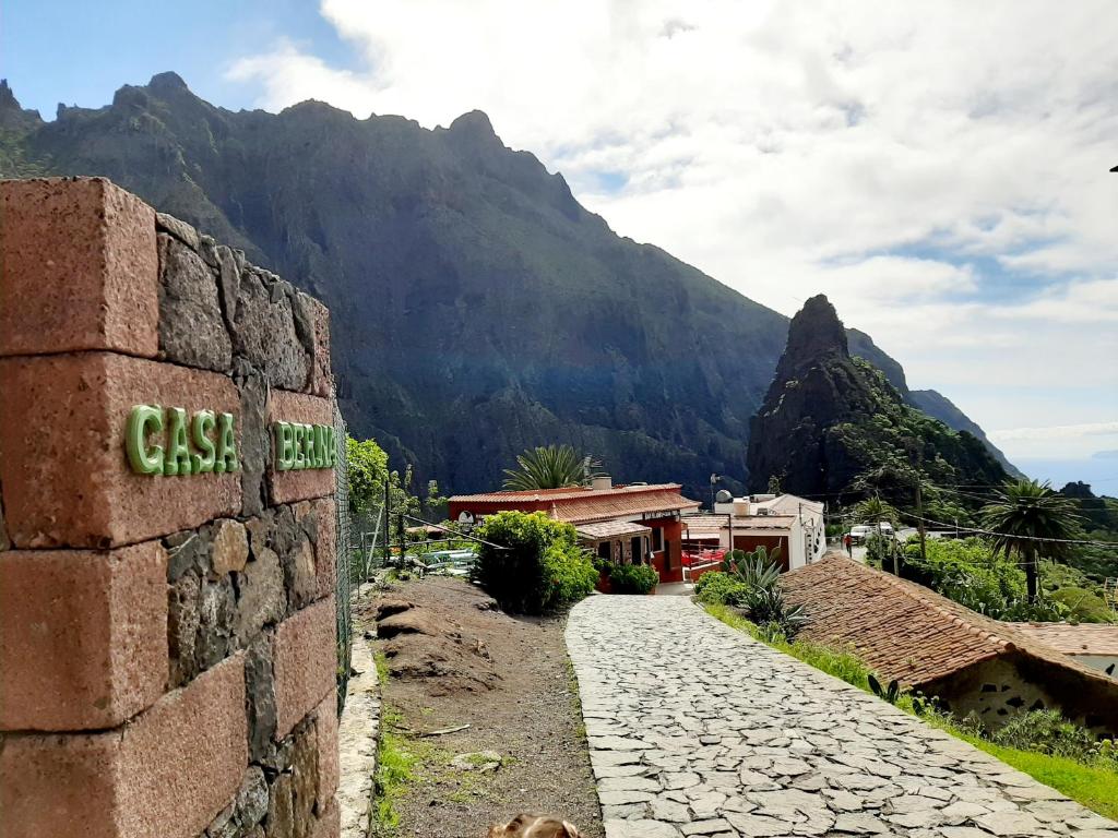 a stone path with a mountain in the background at Casa Berna in Masca