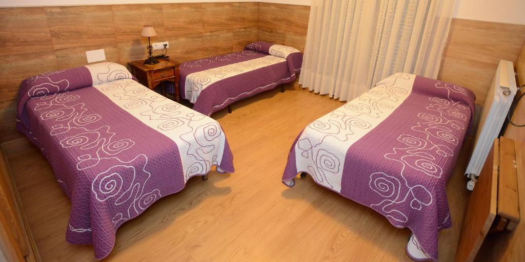 A bed or beds in a room at Domus Viatoris