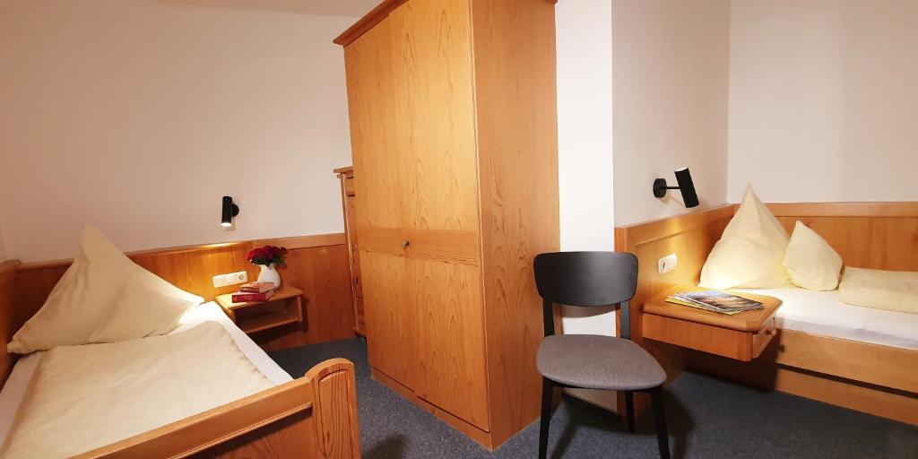 Postel nebo postele na pokoji v ubytování Ferienwohnungen KUR-ECK