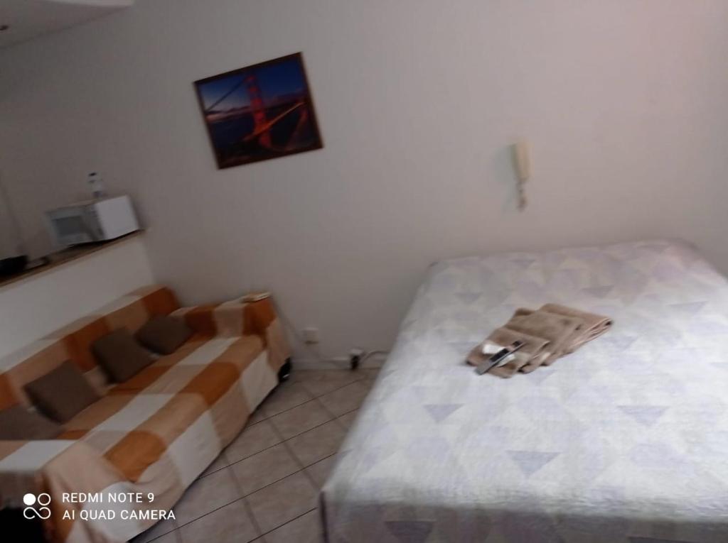 Postel nebo postele na pokoji v ubytování Apto ProntoCardio Rodoviária